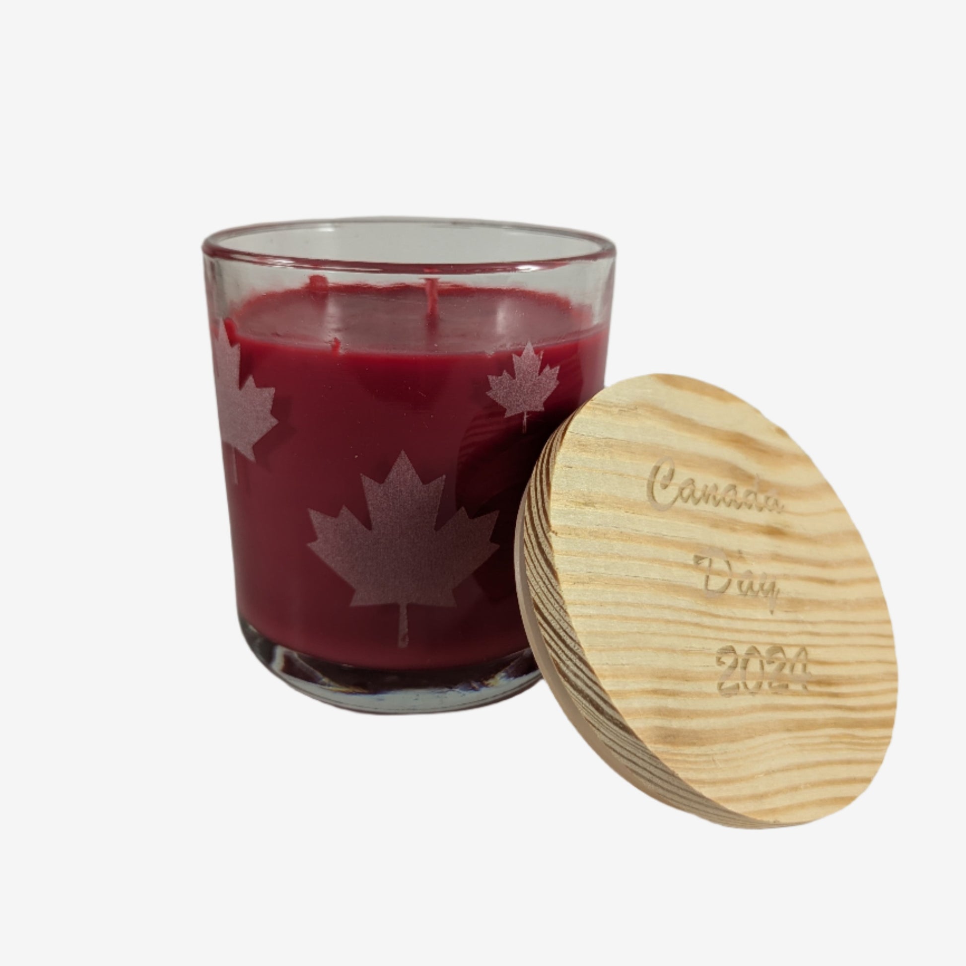 14 oz. soy candle in a glass holder with custom laser-engraved design, adding decorative flair and personalization to any space.