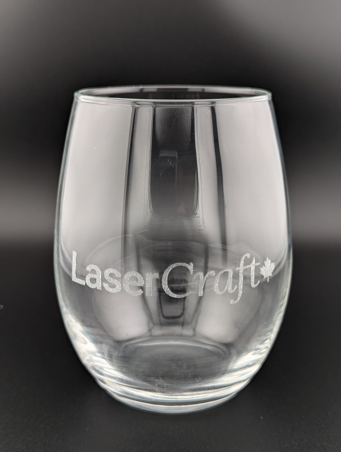 Polar Camel stemless wine glass with custom laser-engraved design, showcasing elegant craftsmanship and personalized detailing.